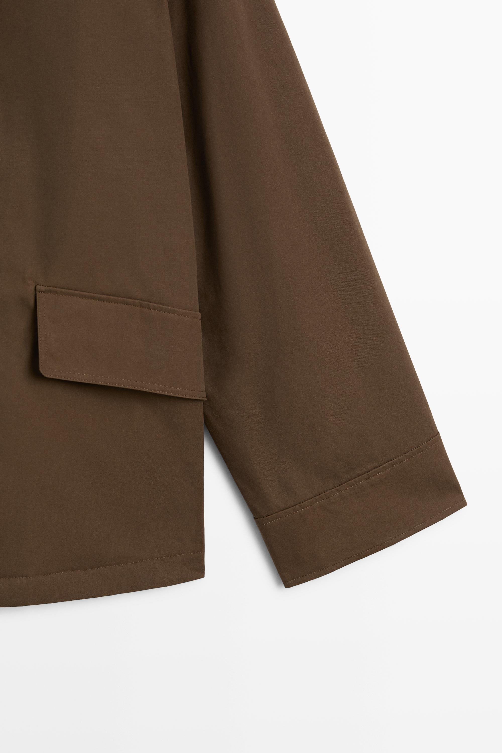 Veste enduite col montant en velours côtelé